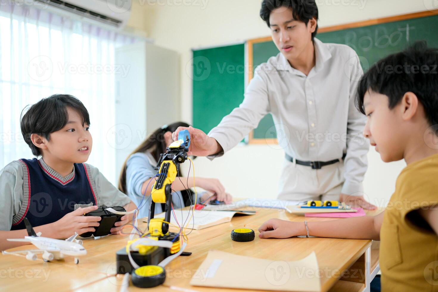 STEM Class, Teacher and students in basic engineering classroom photo