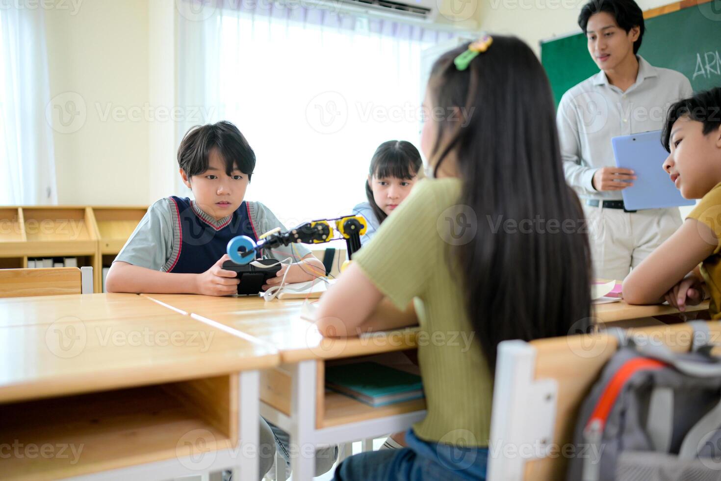 STEM Class, Teacher and students in basic engineering classroom photo