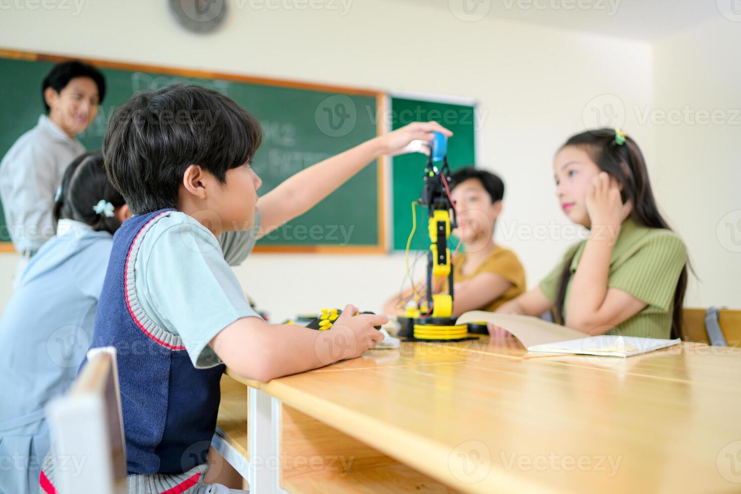 STEM Class, Teacher and students in basic engineering classroom photo