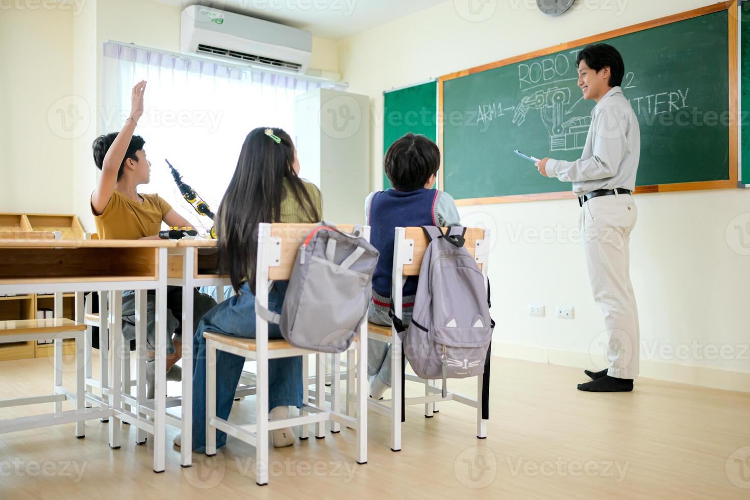 STEM Class, Teacher and students in basic engineering classroom photo