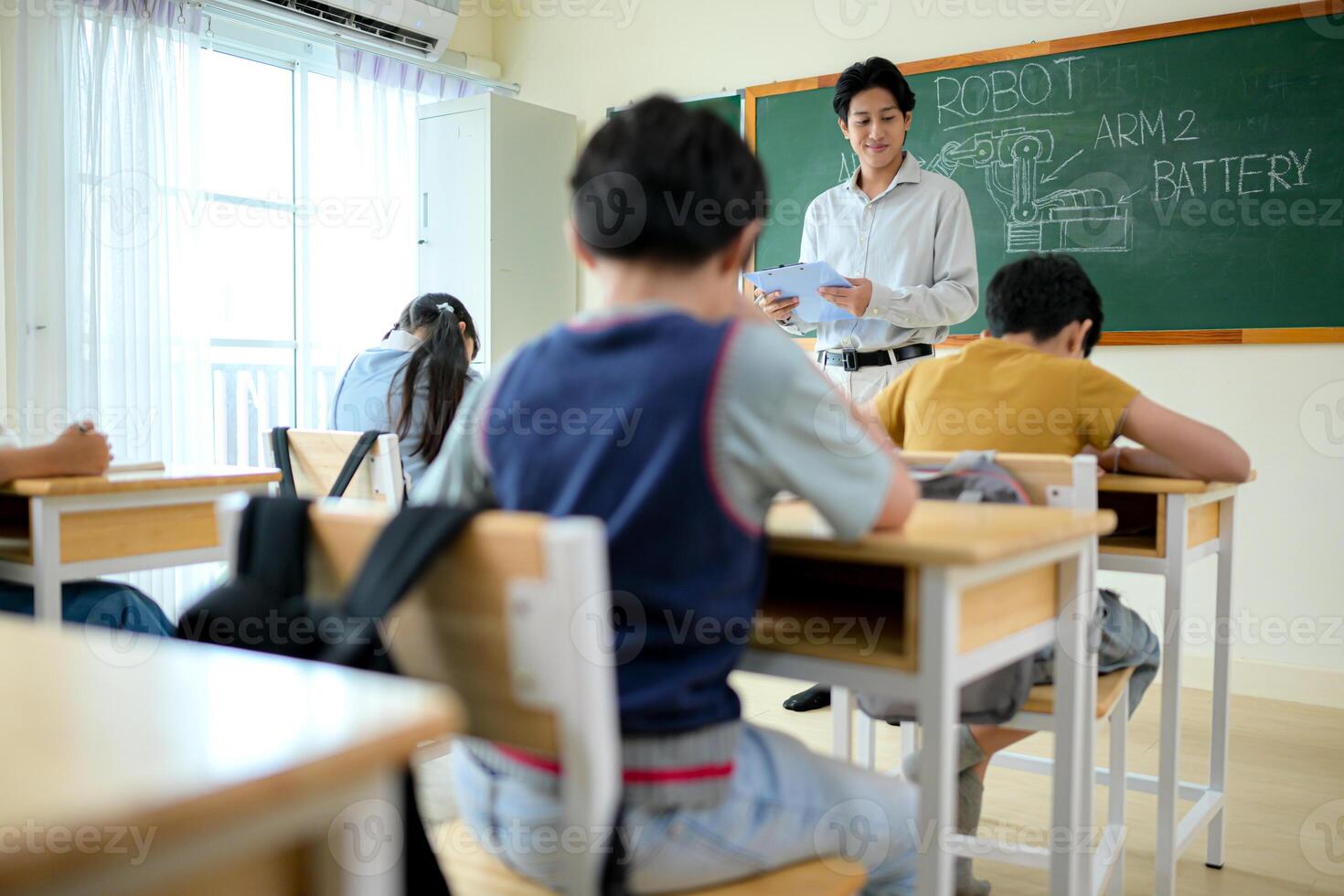 STEM Class, Teacher and students in basic engineering classroom photo