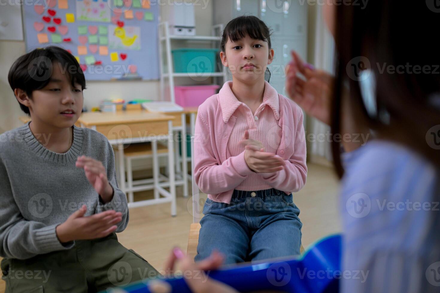Ukelele Class, Teacher and students in music classroom photo