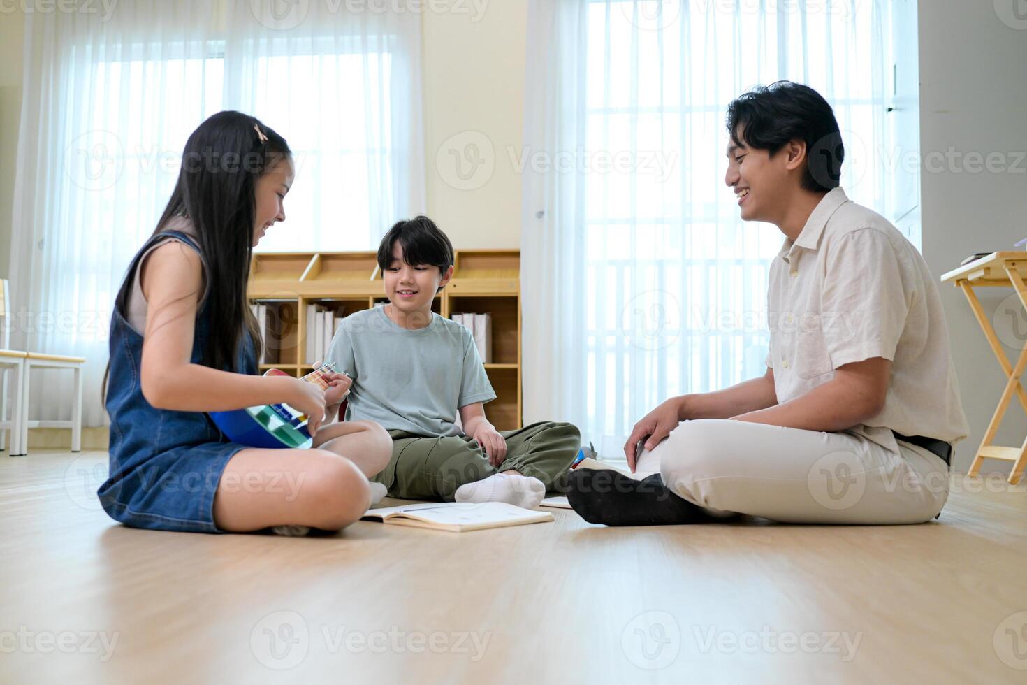 Ukelele Class, Teacher and students in music classroom photo