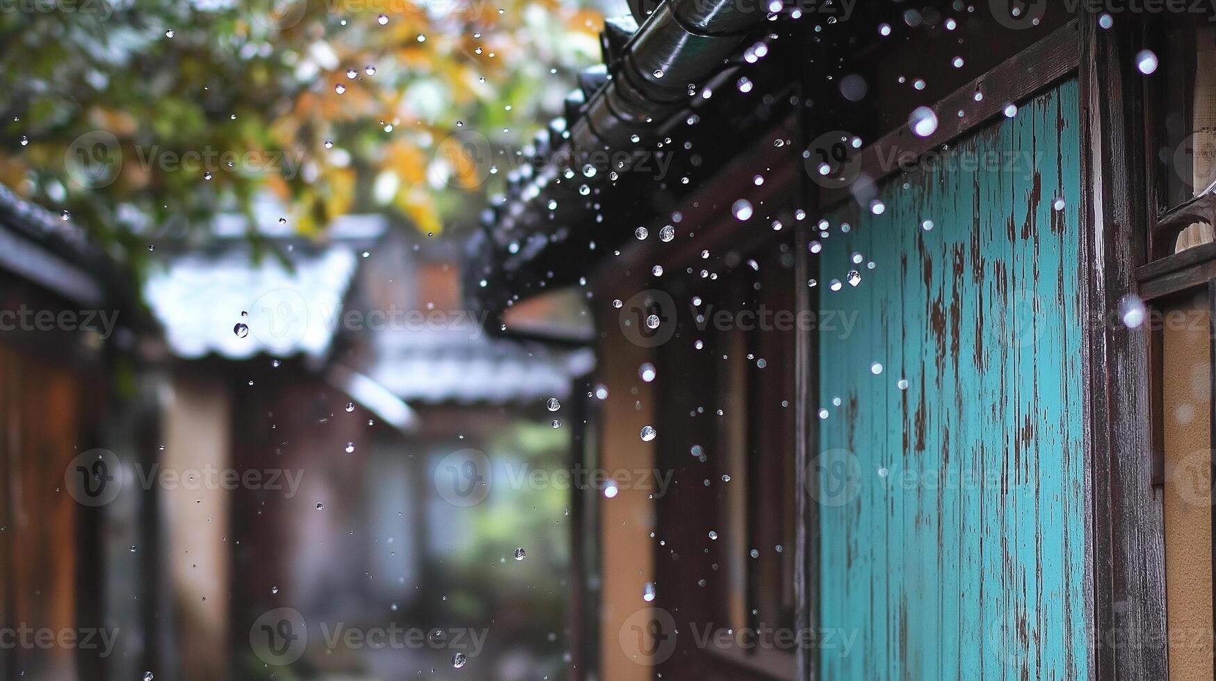 Rain drops falling on a wooden door photo