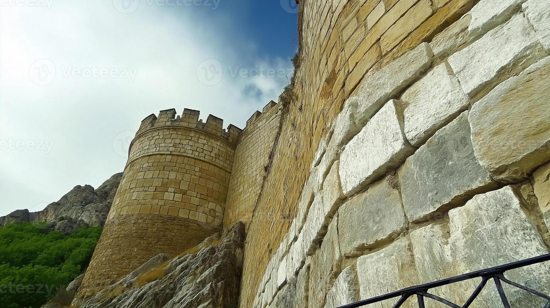 The castle walls of the city of seville, spain photo