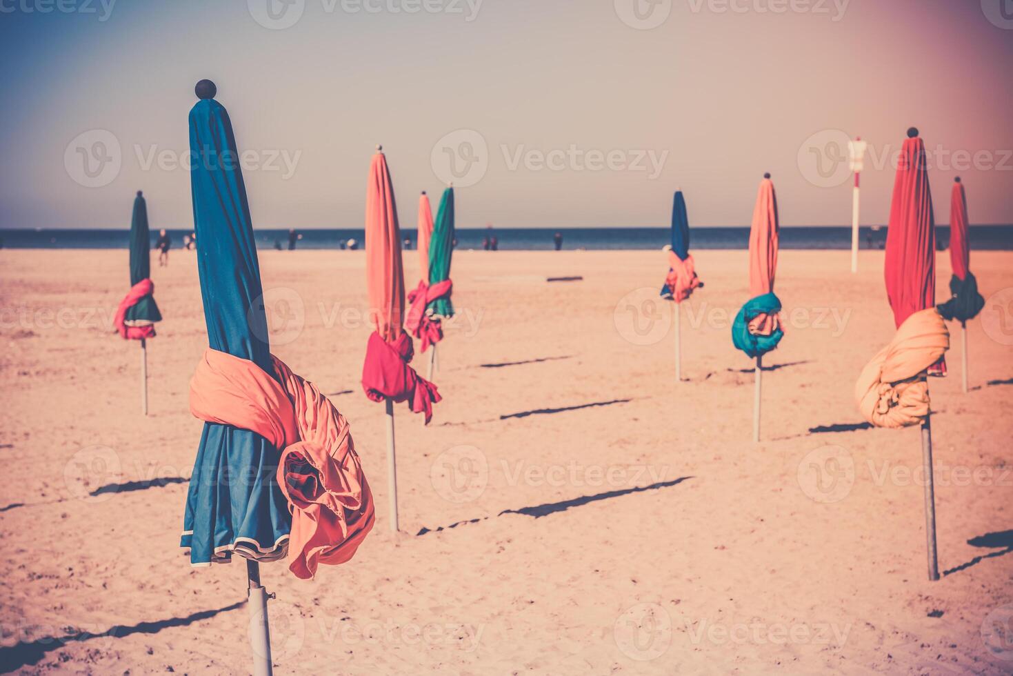 The famous colorful parasols on Deauville beach photo