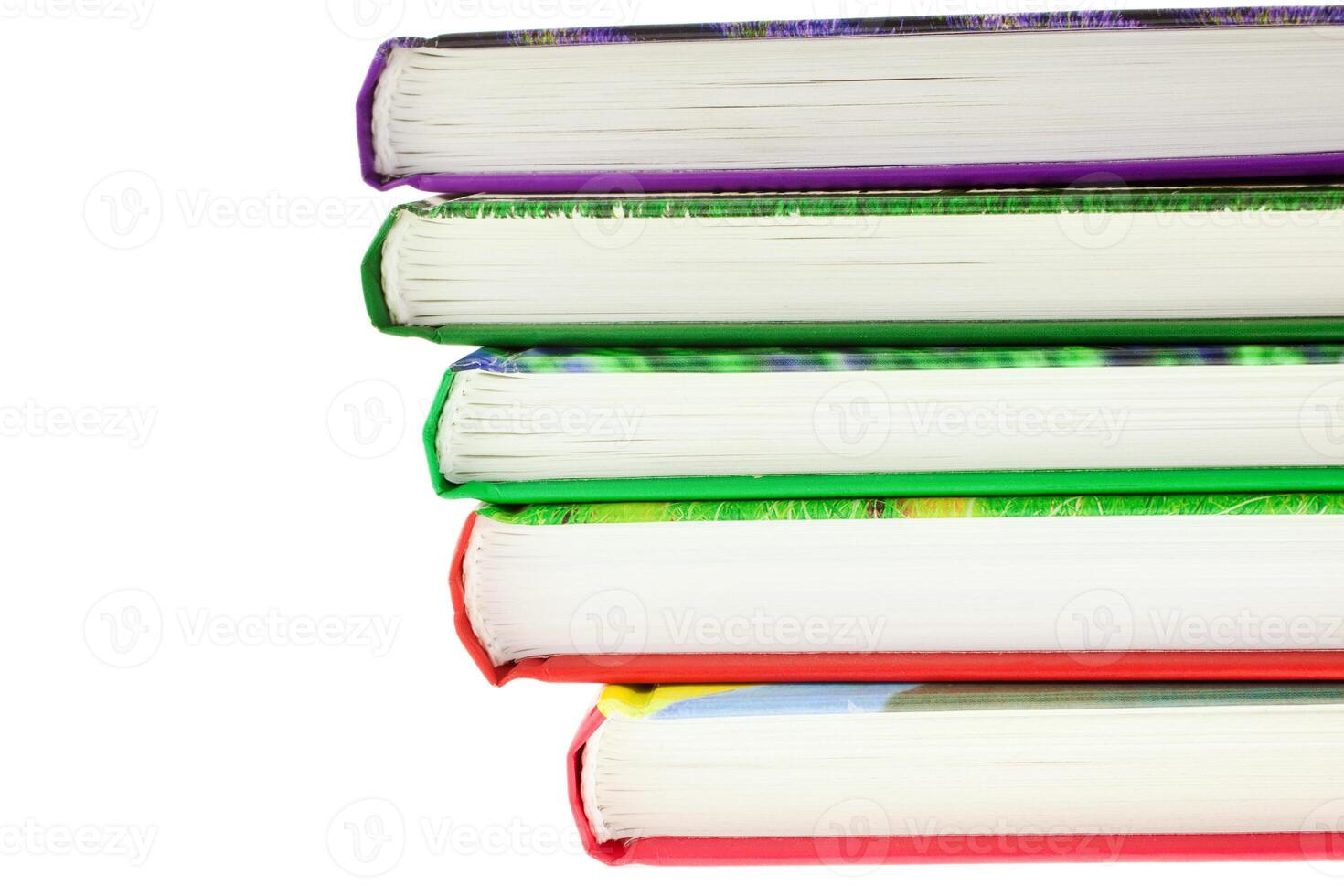multicolored books stack isolated photo