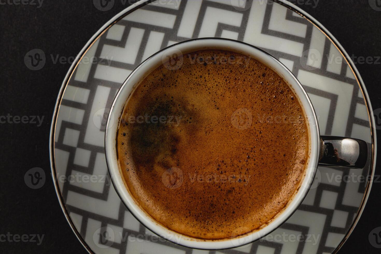 Silver cup with fragrant black Turkish coffee photo
