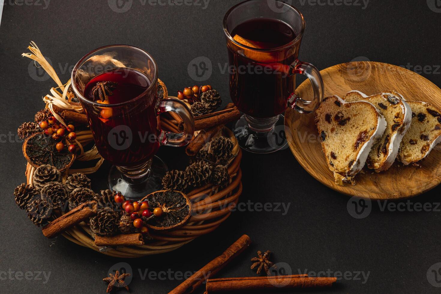 Warm fresh mulled wine with spices for a festive winter evening photo