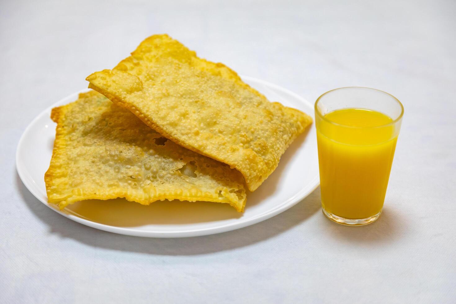 Traditional Brazilian fried pastry stuffed with ground beef. Pastel de feira. photo