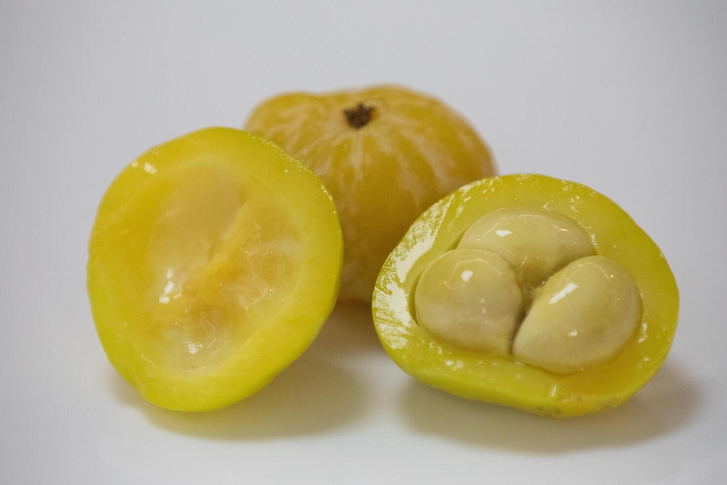 Ripe edible wild fruit from the Brazilian cerrado biome, fruit known as cagaita Stenocalyx dysentericus of the Magnoliopsida class and the Myrtaceae family. photo