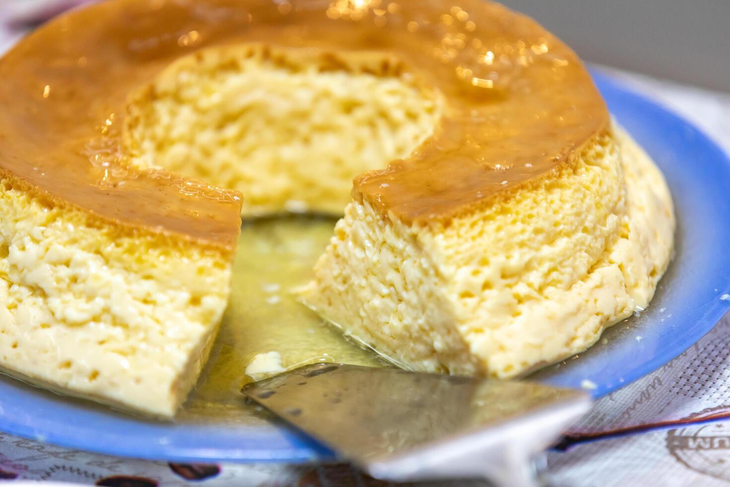Milk ans eggs Pudding or Pudim de leite. Brazilian dessert homemade caramel custard pudding. Traditional brazilian flan photo