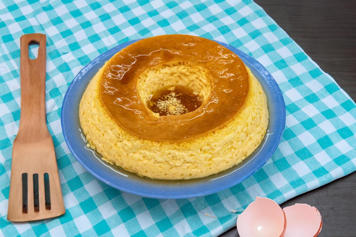Milk ans eggs Pudding or Pudim de leite. Brazilian dessert homemade caramel custard pudding. Traditional brazilian flan photo