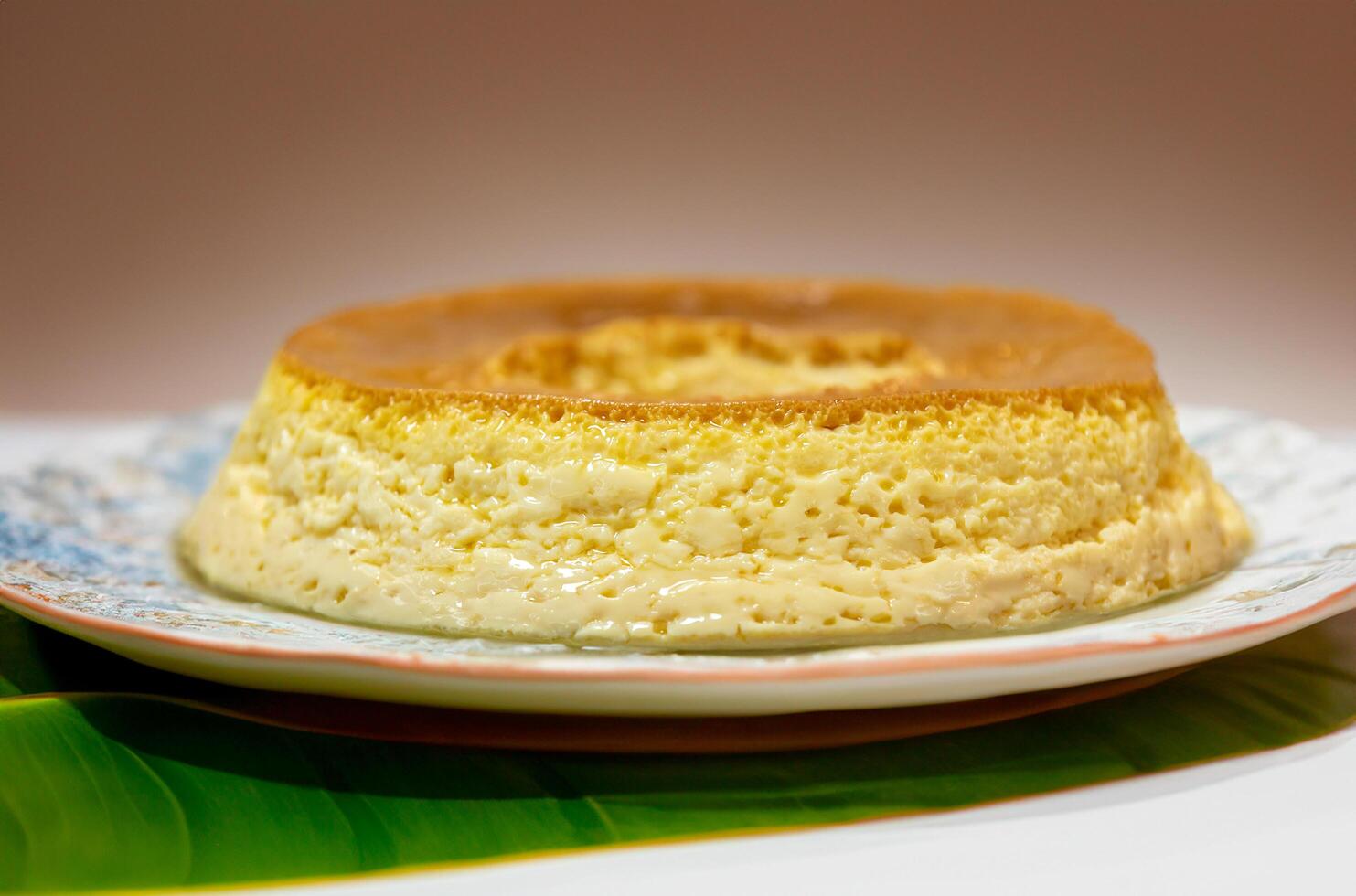Milk ans eggs Pudding or Pudim de leite. Brazilian dessert homemade caramel custard pudding. Traditional brazilian flan photo