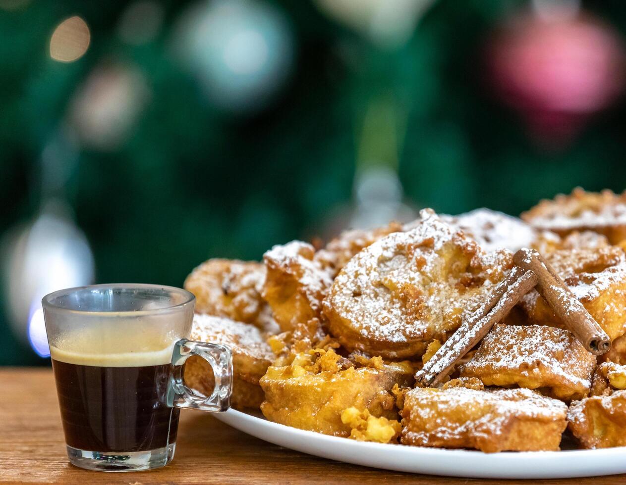 Authentic sweet Christmas French toast served with sugar and cinnamon in a Christmas atmosphere photo
