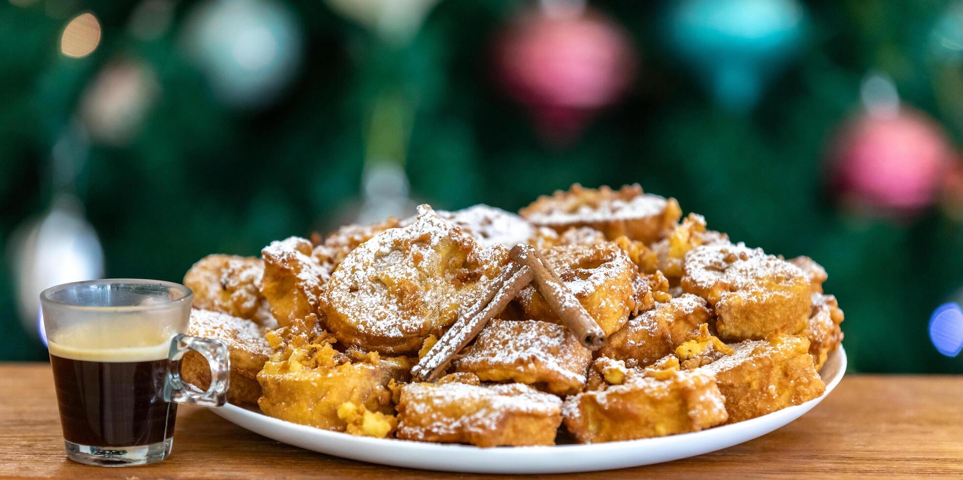 Authentic sweet Christmas French toast served with sugar and cinnamon in a Christmas atmosphere photo
