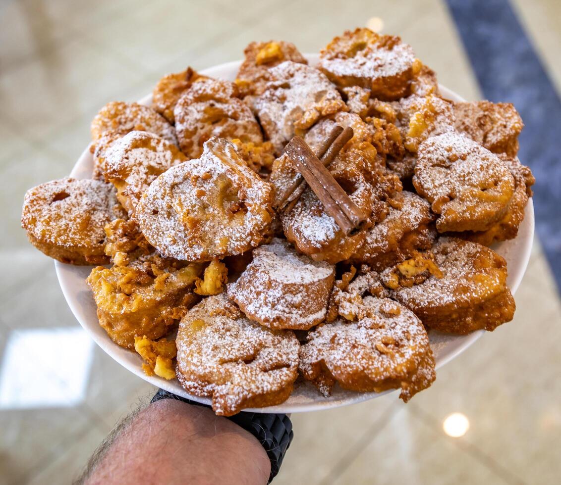 Authentic sweet Christmas French toast served with sugar and cinnamon in a Christmas atmosphere photo