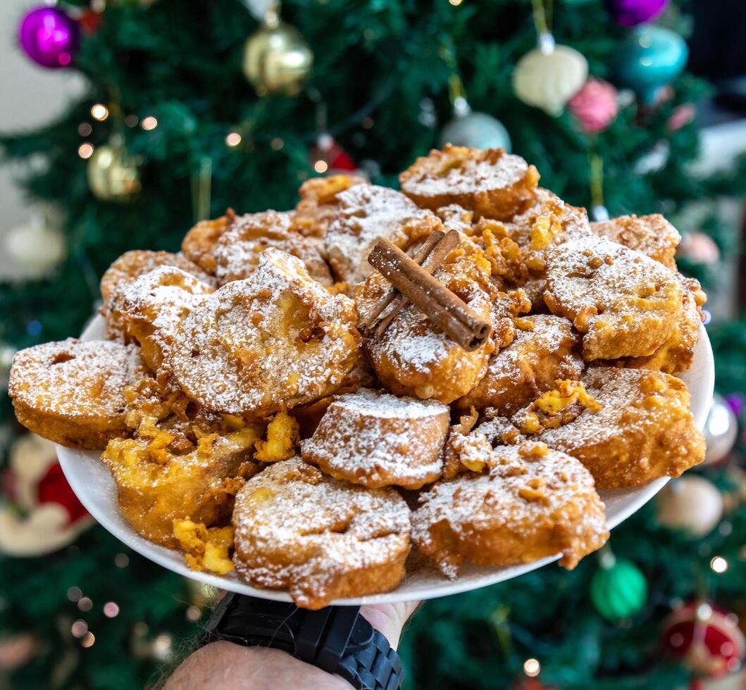 Authentic sweet Christmas French toast served with sugar and cinnamon in a Christmas atmosphere photo