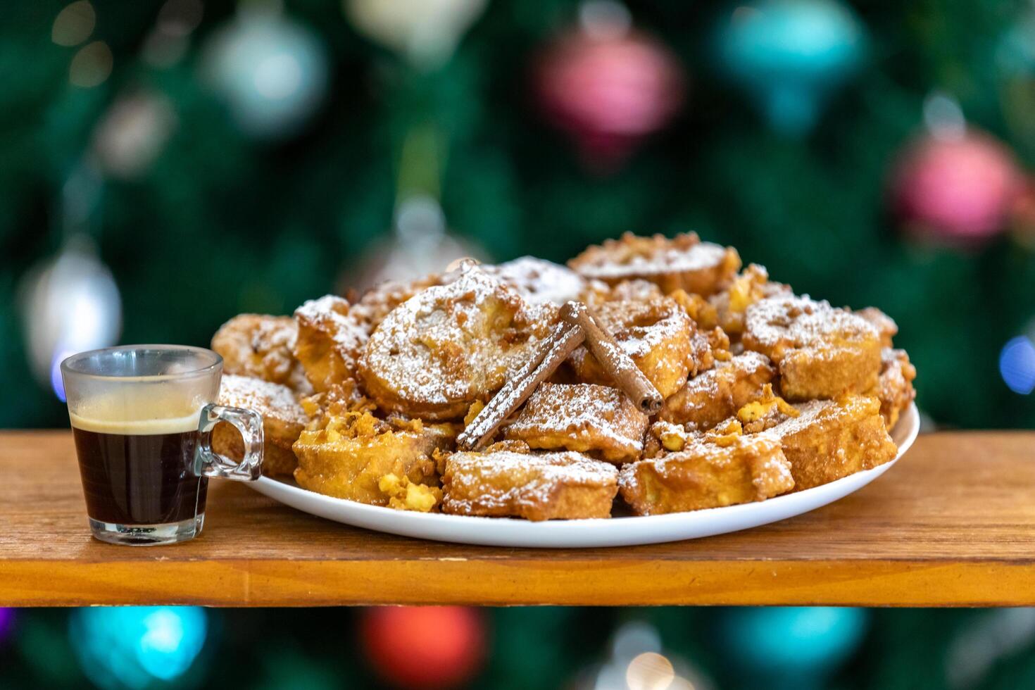 Authentic sweet Christmas French toast served with sugar and cinnamon in a Christmas atmosphere photo