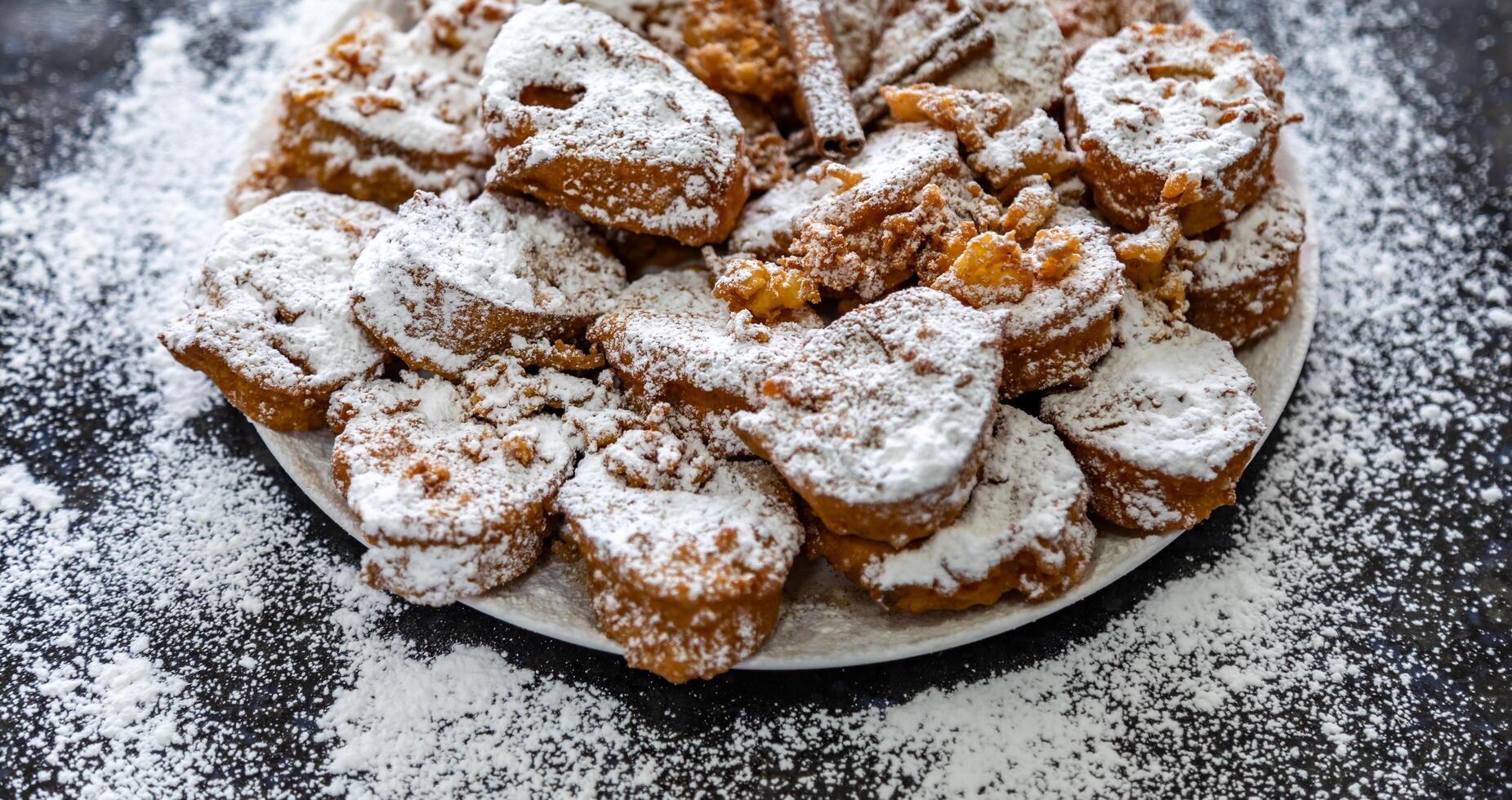 Authentic sweet Christmas French toast served with sugar and cinnamon in a Christmas atmosphere photo