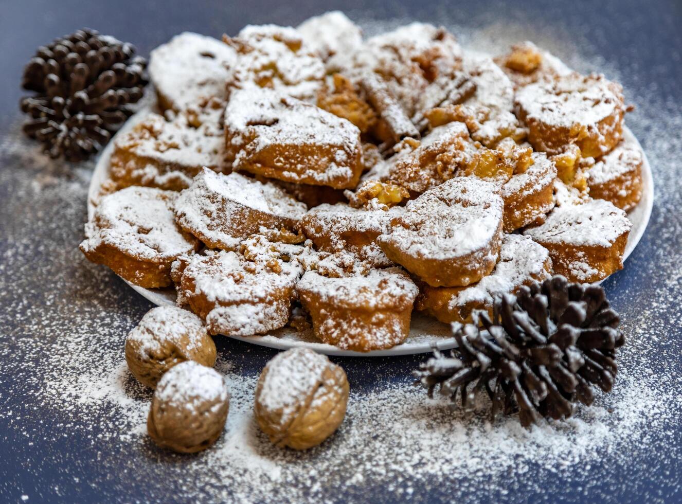 Authentic sweet Christmas French toast served with sugar and cinnamon in a Christmas atmosphere photo