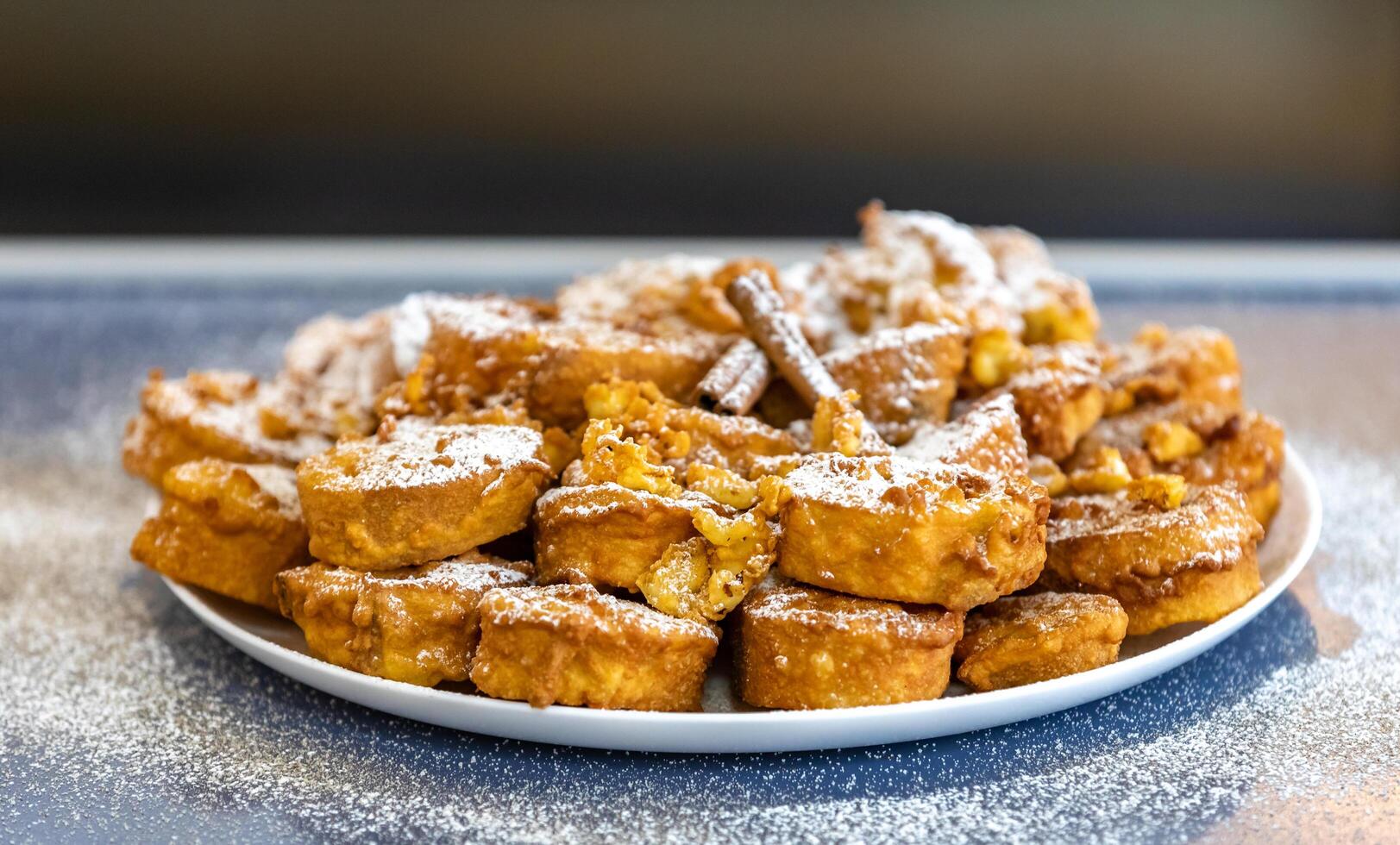 Authentic sweet Christmas French toast served with sugar and cinnamon in a Christmas atmosphere photo