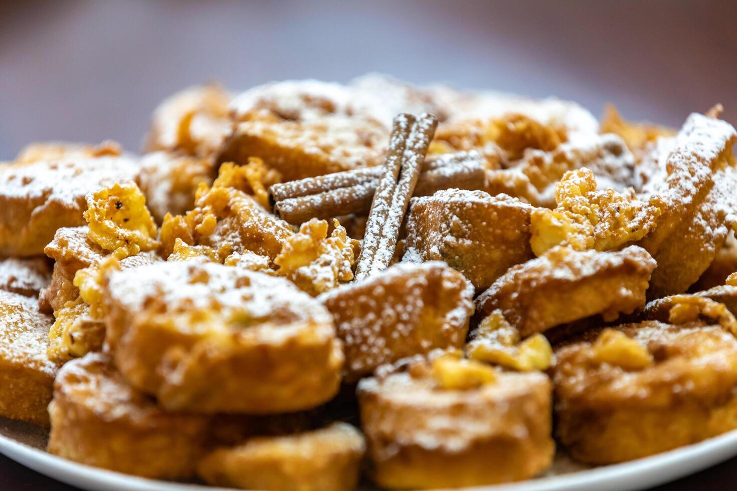 Authentic sweet Christmas French toast served with sugar and cinnamon in a Christmas atmosphere photo