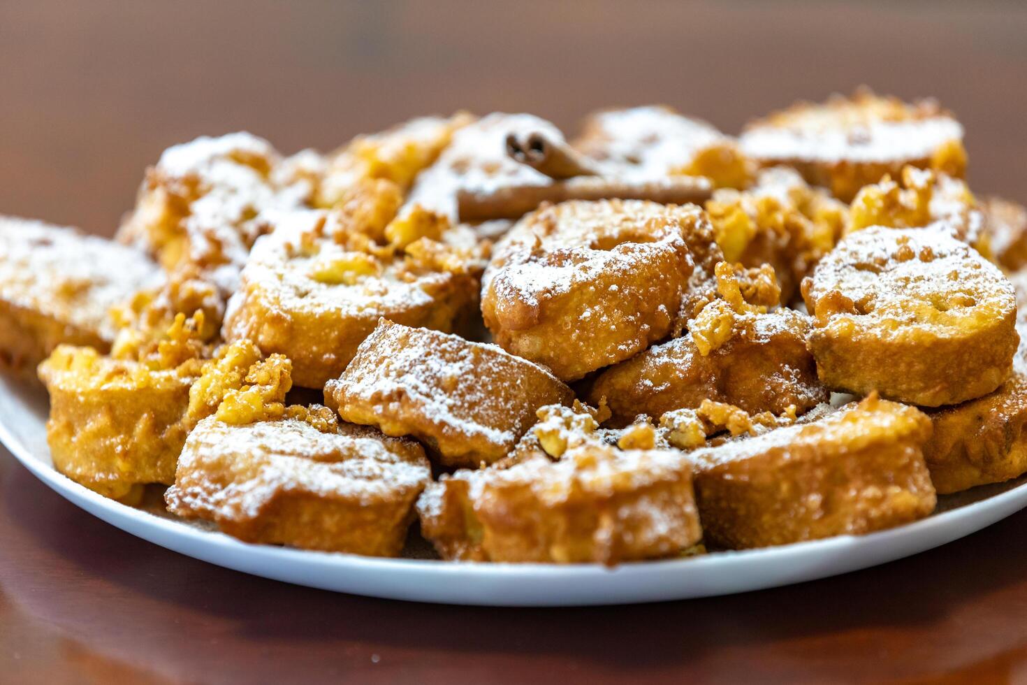 Authentic sweet Christmas French toast served with sugar and cinnamon in a Christmas atmosphere photo