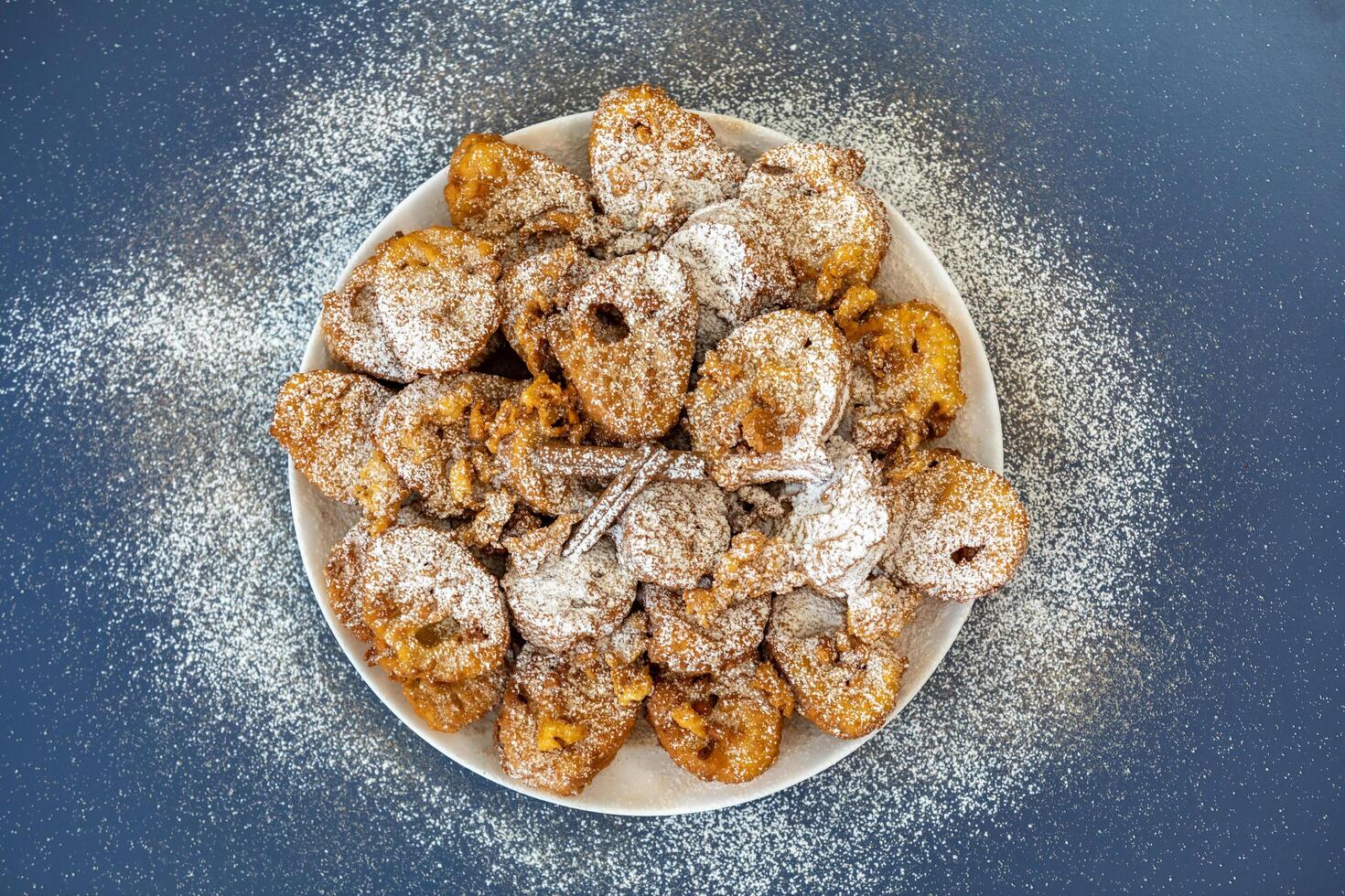Authentic sweet Christmas French toast served with sugar and cinnamon in a Christmas atmosphere photo