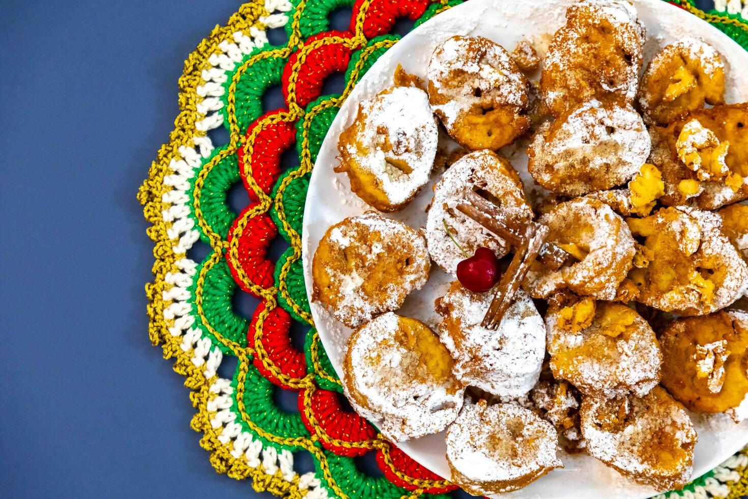 Authentic sweet Christmas French toast served with sugar and cinnamon in a Christmas atmosphere photo