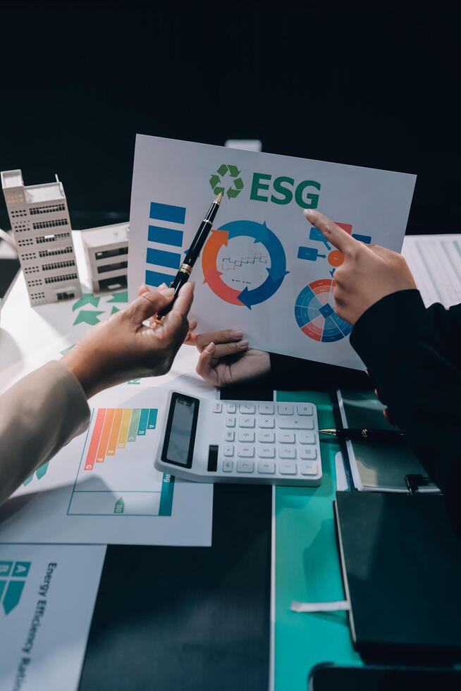 Carbon offset price report CO2 emission. Future growth Net zero waste in ESG ethical SME office protect climate change global warming social issues project. Group of asia people Eco friendly SDGs plan photo