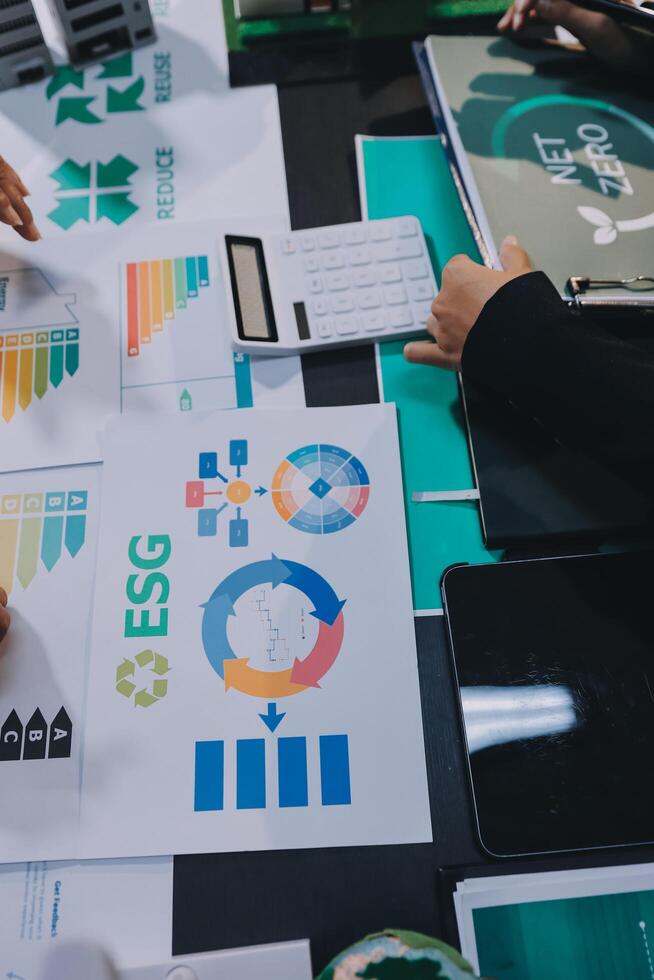 Carbon offset price report CO2 emission. Future growth Net zero waste in ESG ethical SME office protect climate change global warming social issues project. Group of asia people Eco friendly SDGs plan photo
