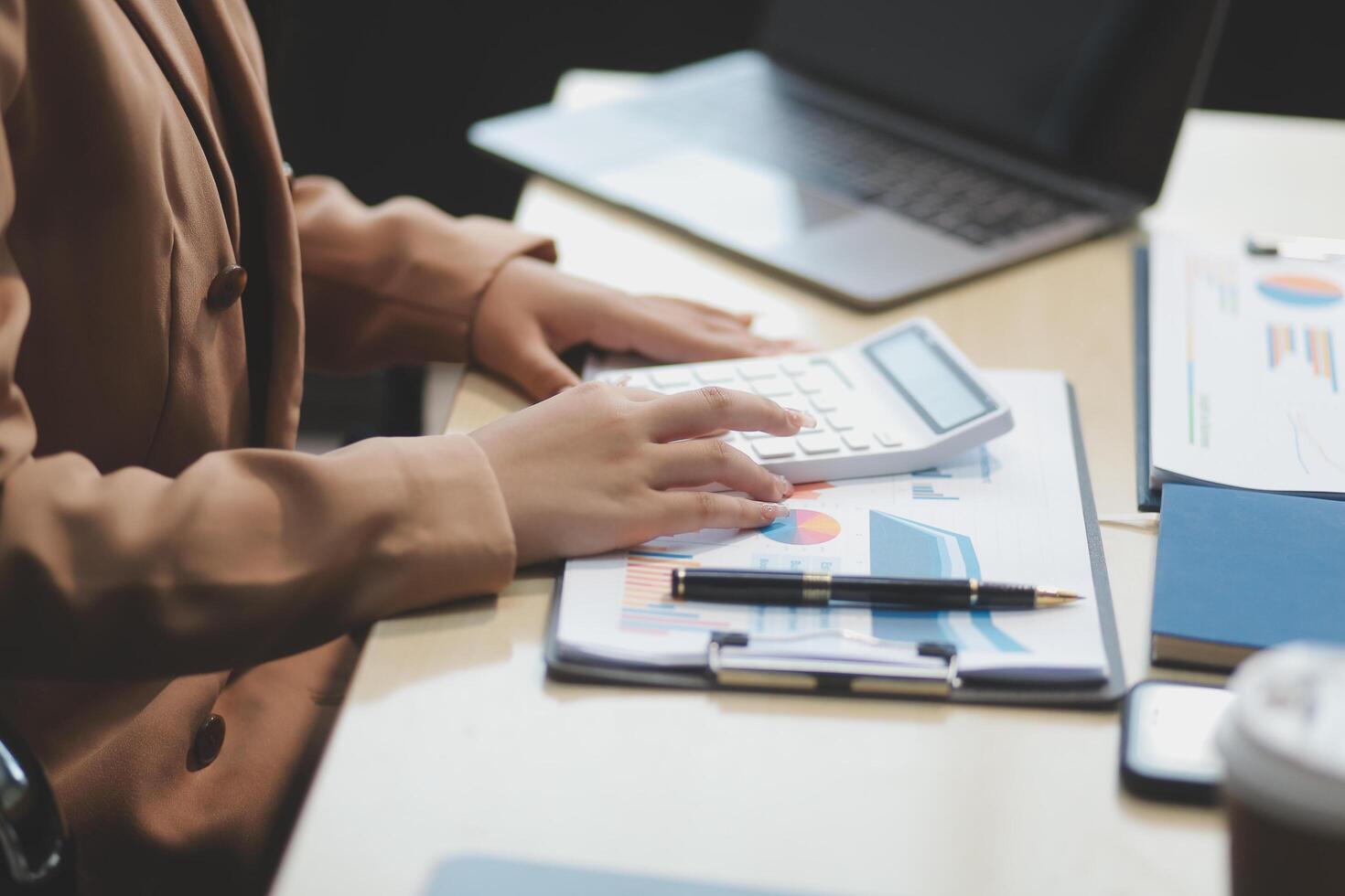 business documents businessman check legal document review Prepare documents or analysis reports, tax items, accounting documents, data contracts, office partner agreements. photo
