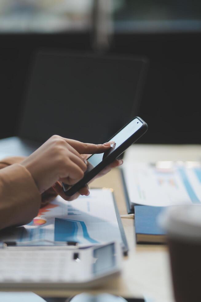 business documents businessman check legal document review Prepare documents or analysis reports, tax items, accounting documents, data contracts, office partner agreements. photo
