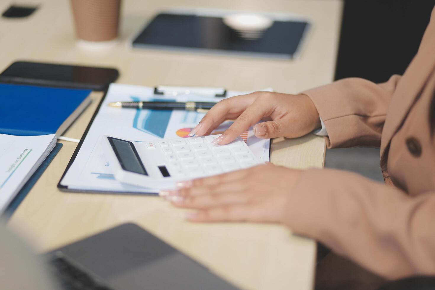 business documents businessman check legal document review Prepare documents or analysis reports, tax items, accounting documents, data contracts, office partner agreements. photo