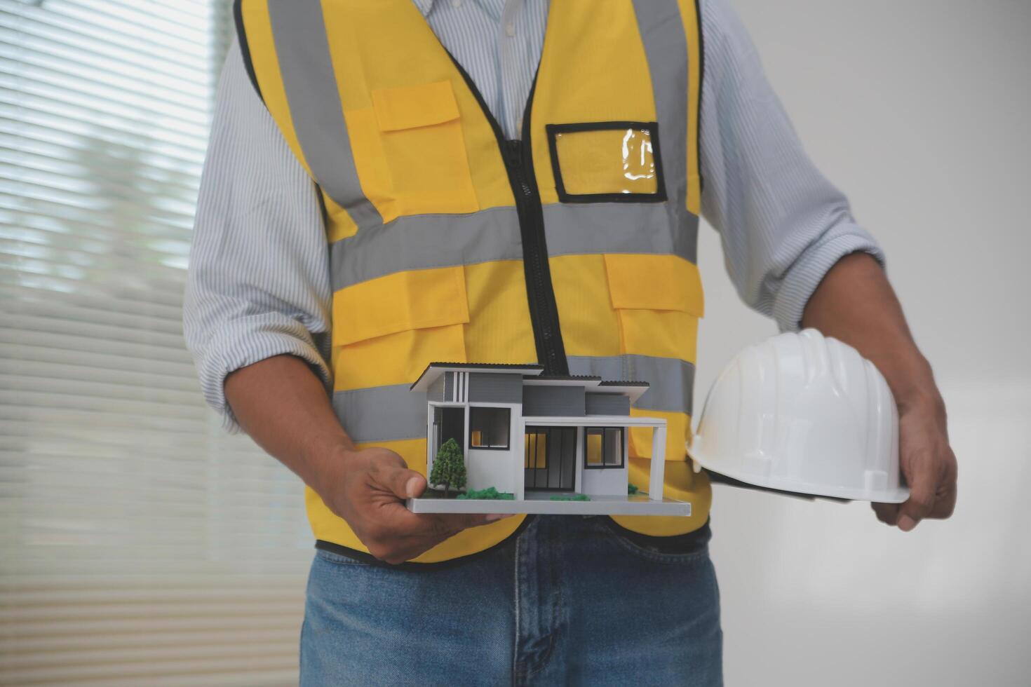 Image of engineer meeting for architectural project. working with partner and engineering tools on workplace vintage tone. photo