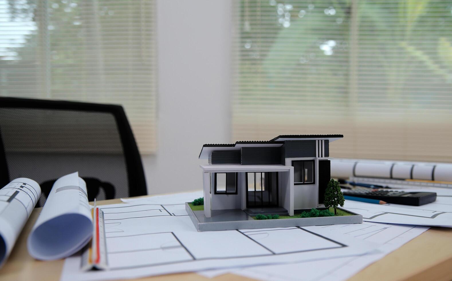 Architects, engineers, contractors working in the office with blueprints, inspection engineers Work analysis for architectural plan, construction project sketch, focus, business construction concept. photo