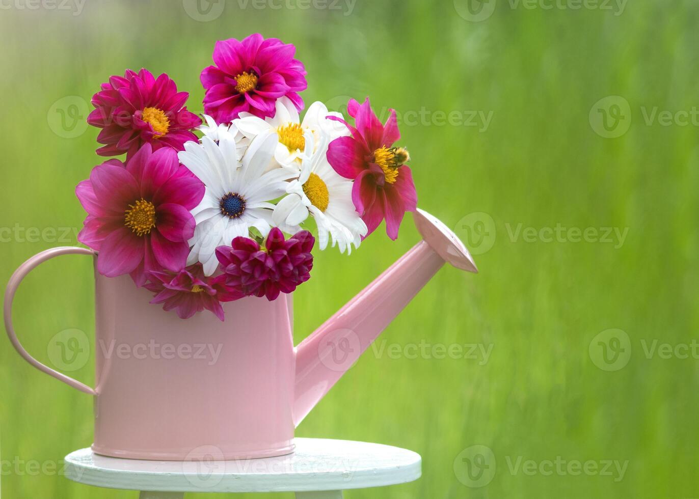 Flowers in a Watering Can photo