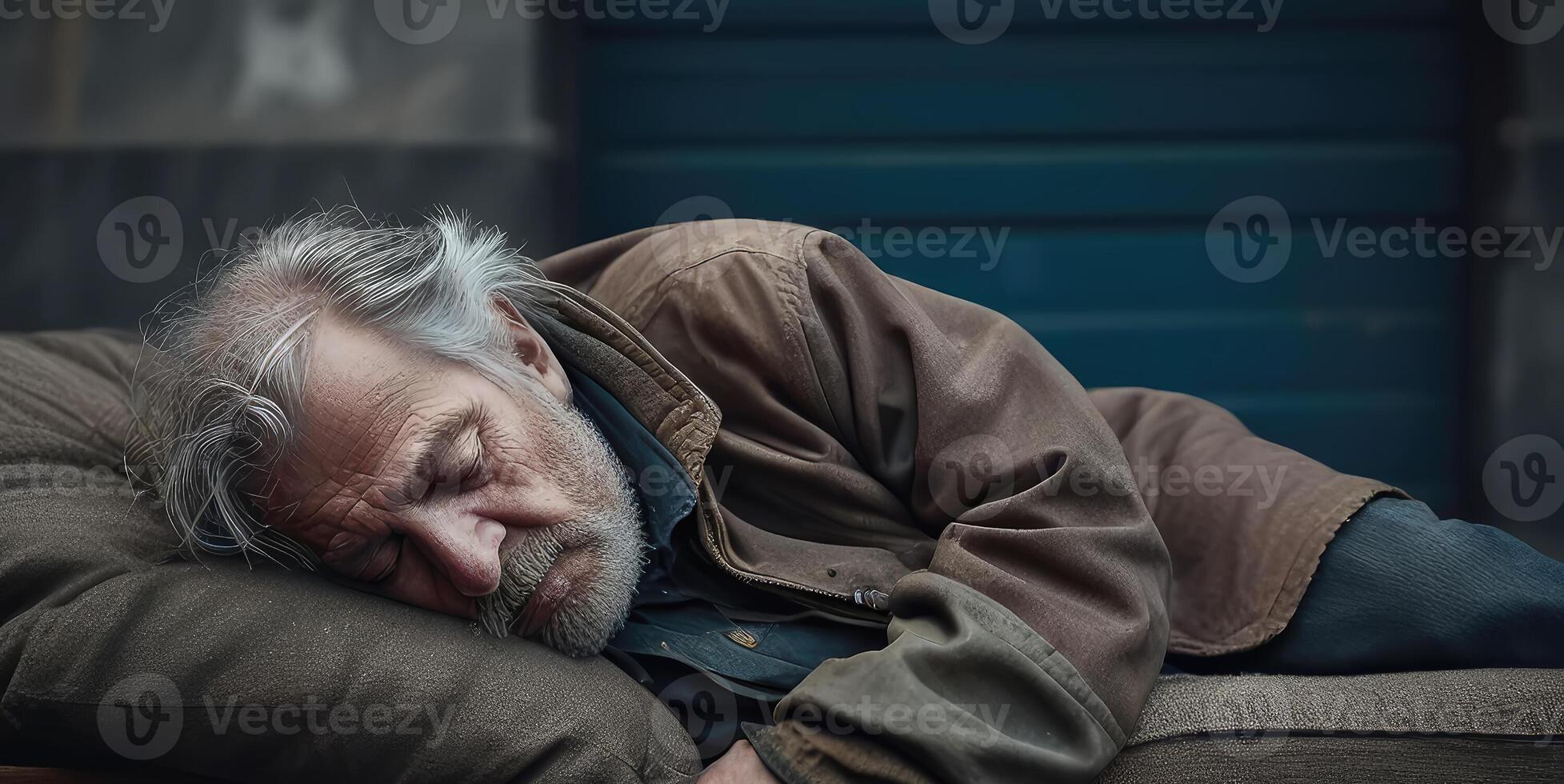Homeless man sleeping in the old sofa. photo