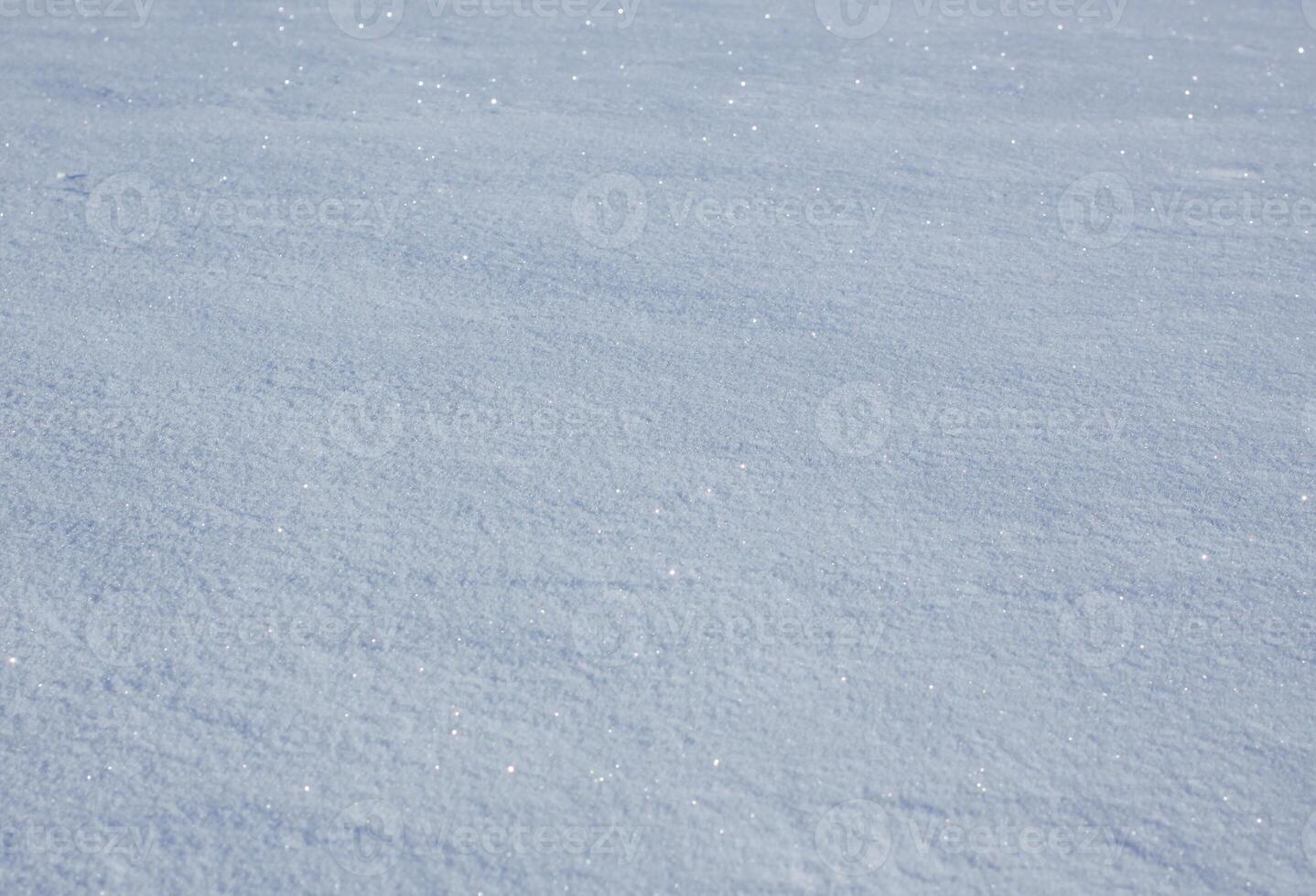 Fresh snow surface in sunny winter day. photo