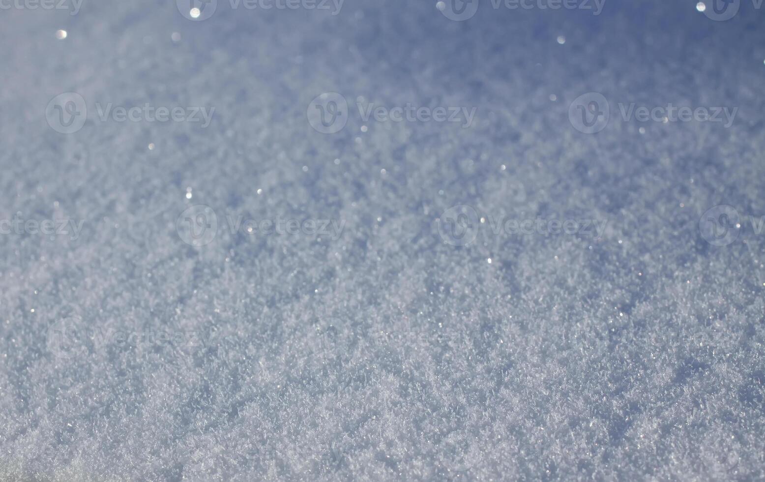 Fresh snow surface in sunny winter day. photo