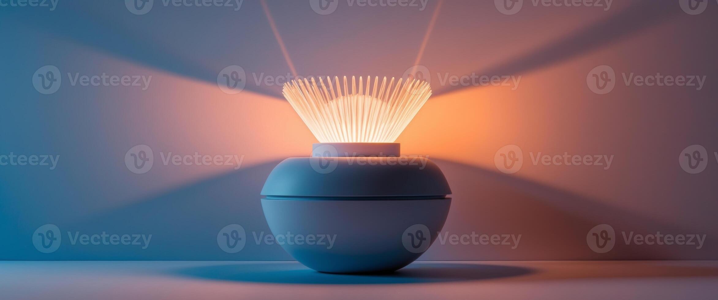 blue and orange Emitting intense light from its upper part. photo