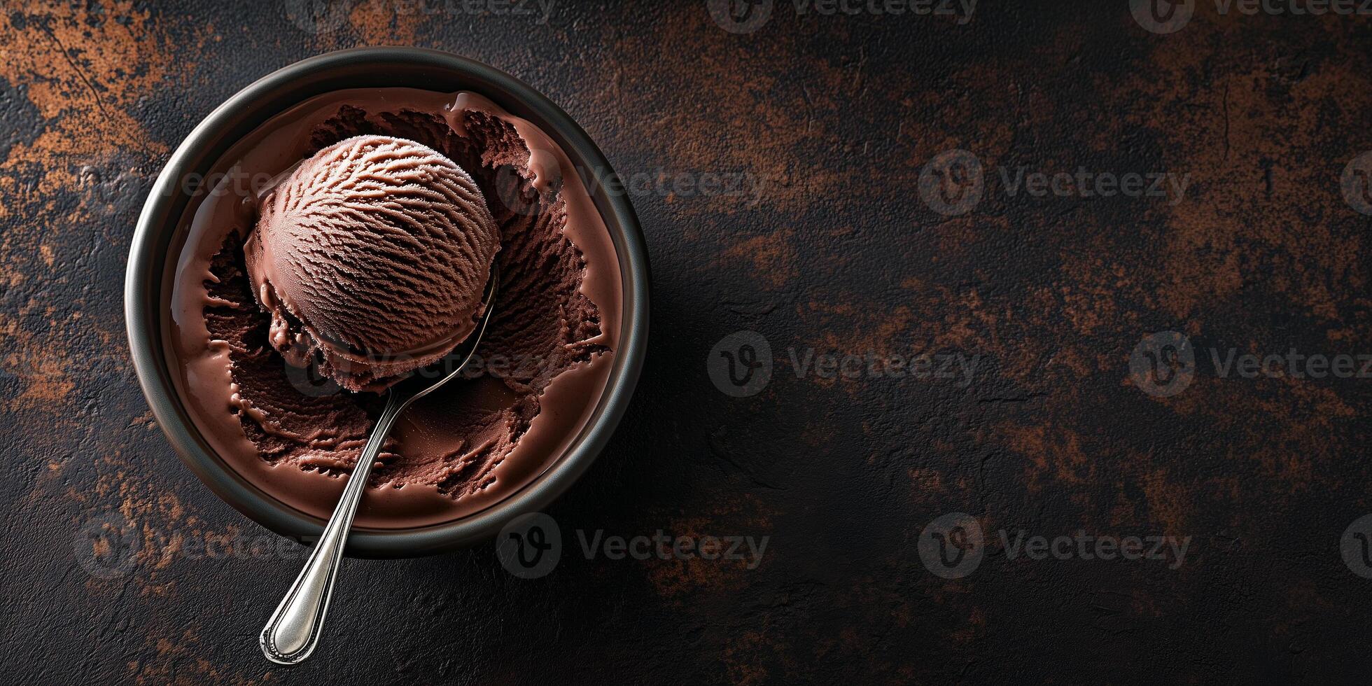 Dish of chocolate ice cream, single scoop beginning to melt under warm lighting, food photography photo