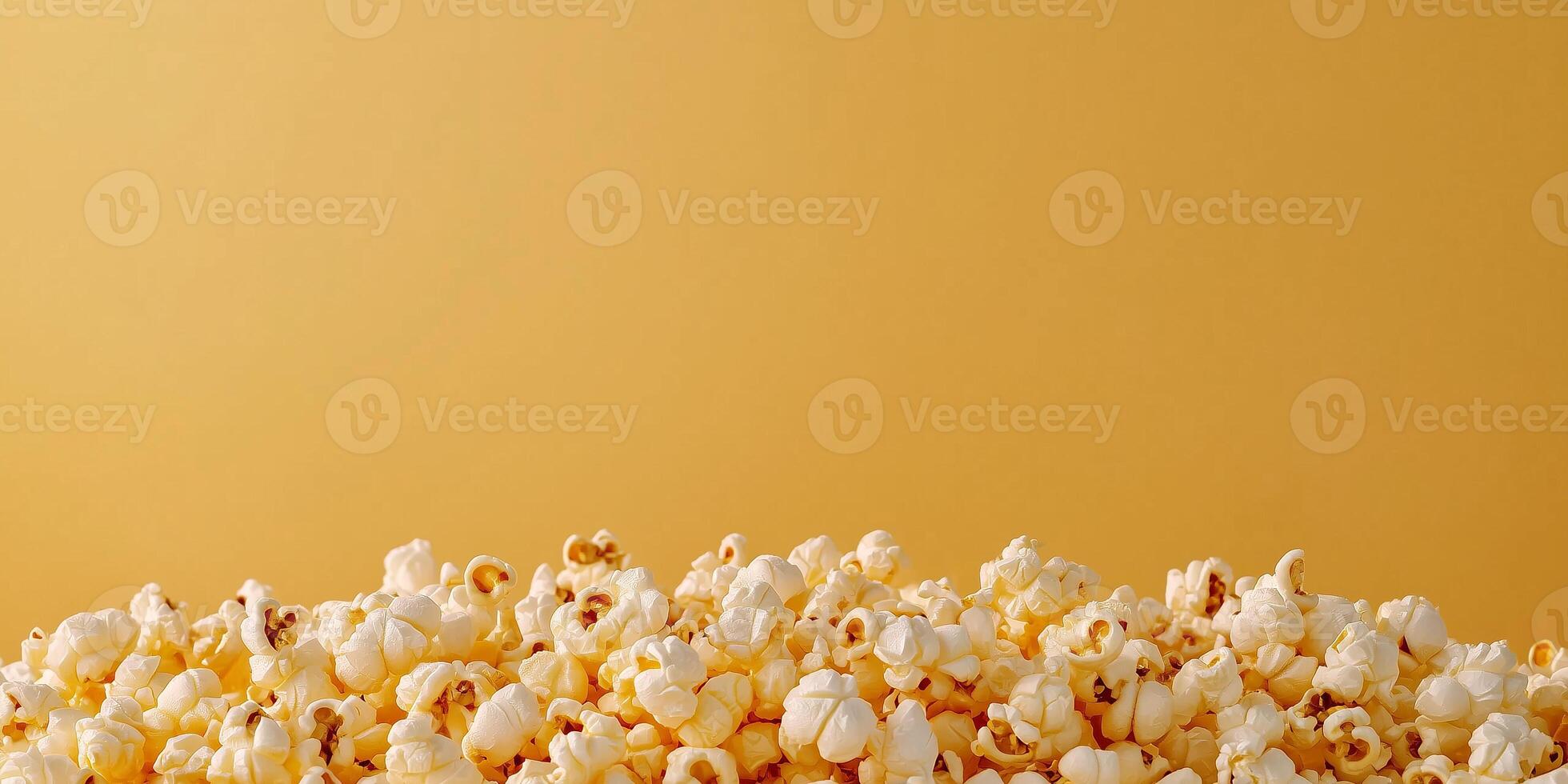 Kettle corn piled high, with popped kernels arranged on a plain background, culinary photography photo