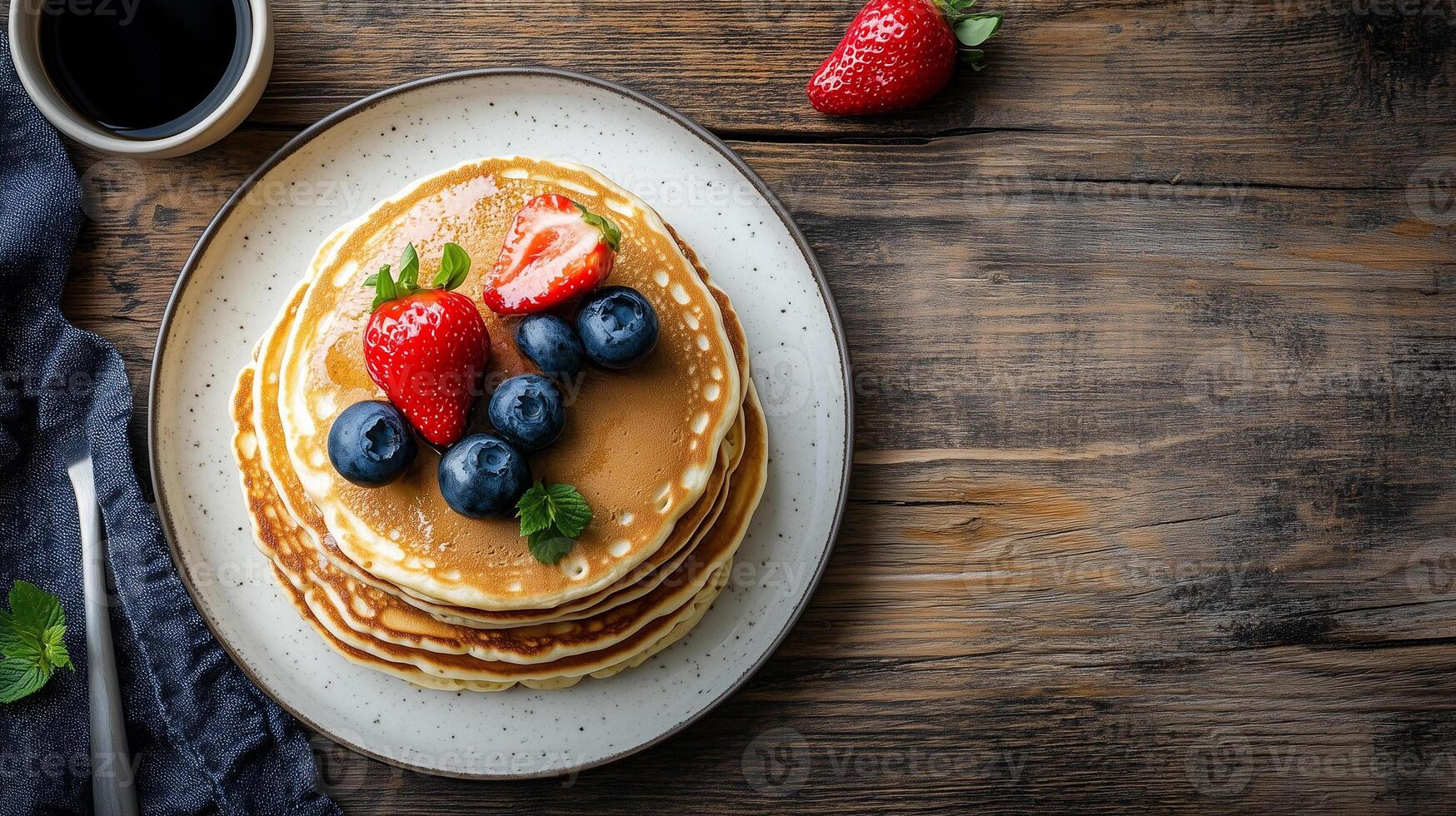 Breakfast table setting with a stack of buttermilk pancakes on one plate, gastronomy photography photo
