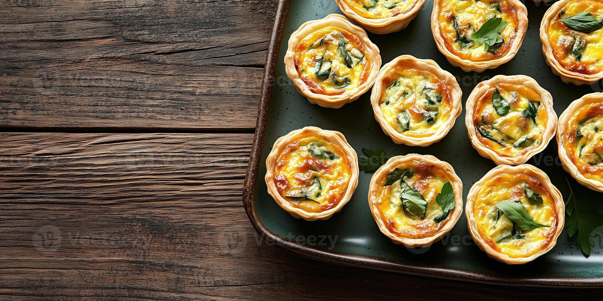 Mini quiches positioned evenly on a rectangular plate, photorealistic food photo