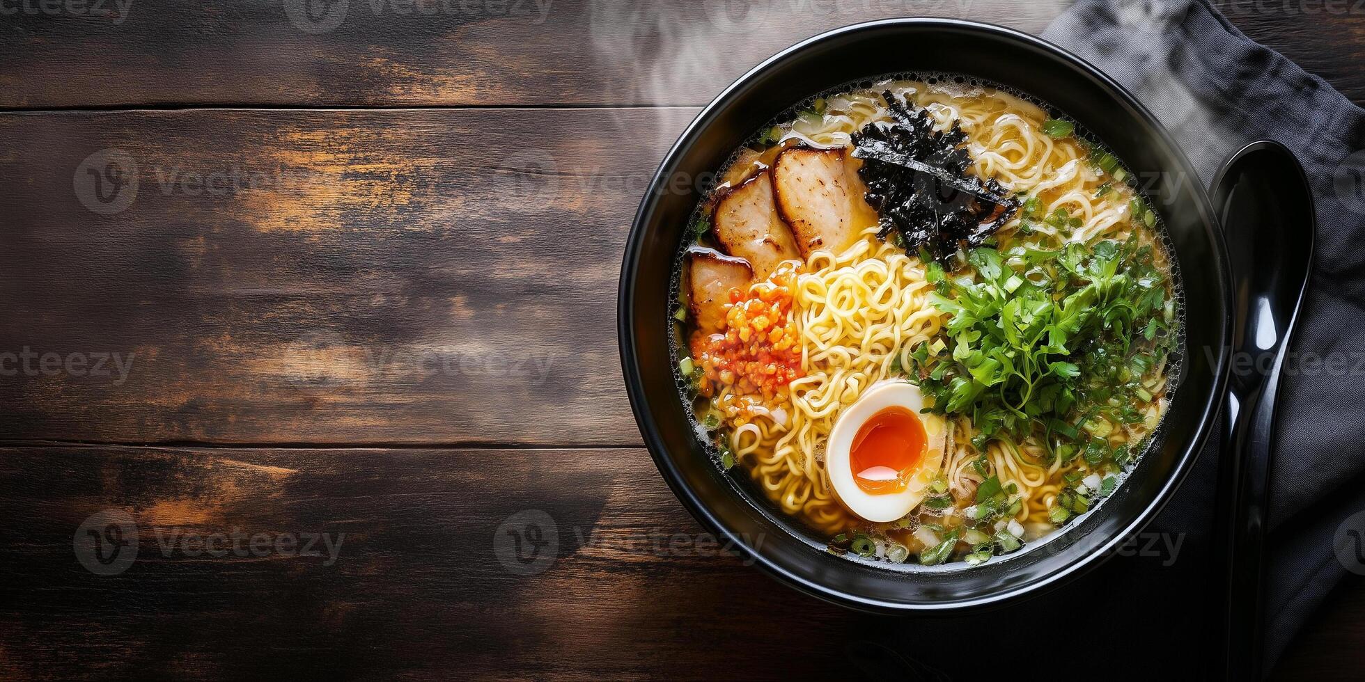 Steaming ramen bowl with broth, noodles, and toppings, with a spoon, food setting photo