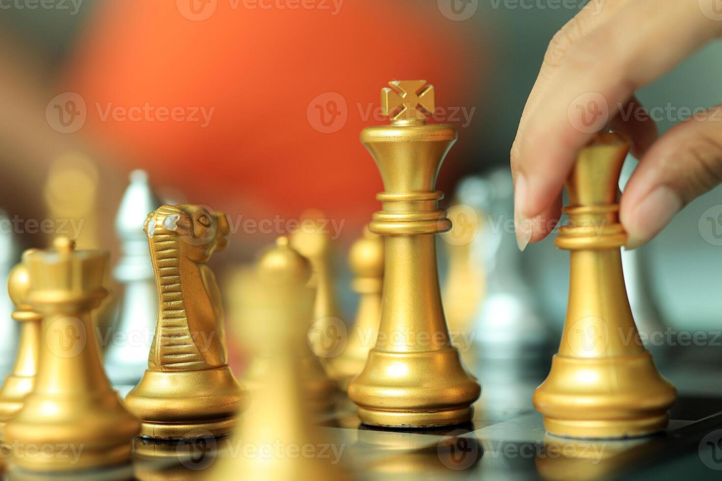 Professional Chess Player Moving a Piece photo