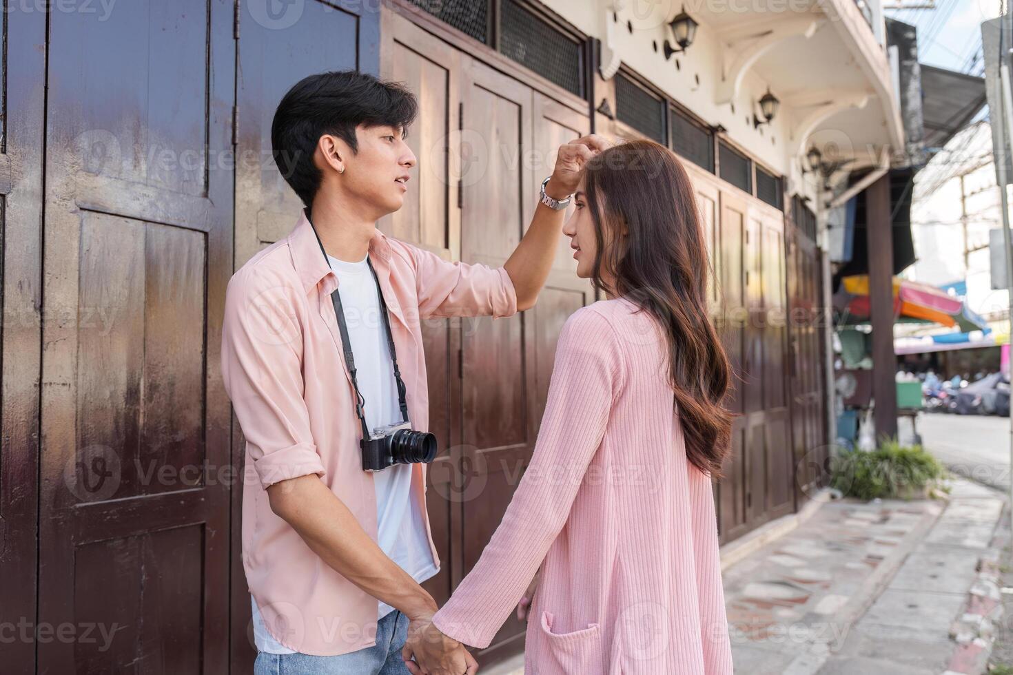 Valentine's day celebration urban street couple interaction romantic atmosphere eye-level view love connection in focus photo