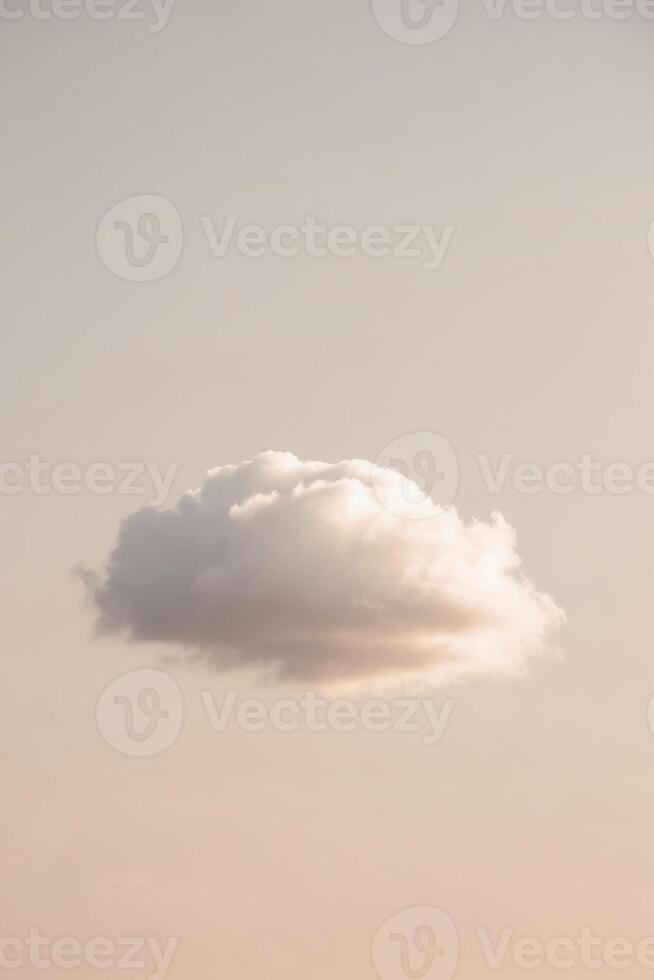 A single cloud floating in the sky photo